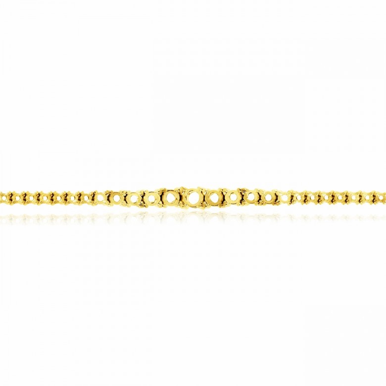 BRACCIALE TENNIS A SCALARE IN ORO GIALLO CALDO 18 KT